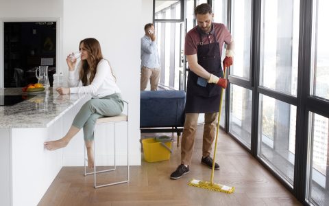 man-servant-cleaning-house