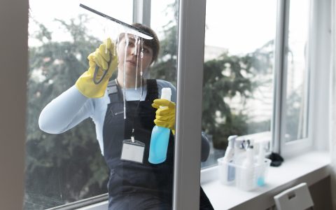 person-taking-care-office-cleaning