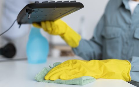 person-taking-care-office-cleaning1
